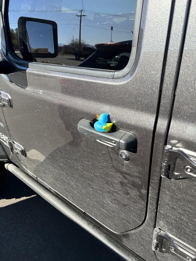 Jeep ducking guide with Duck Jeepers yellow gift box and custom duck package