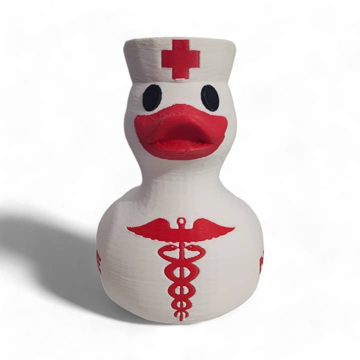 Supplier side view of nurse duck collectible